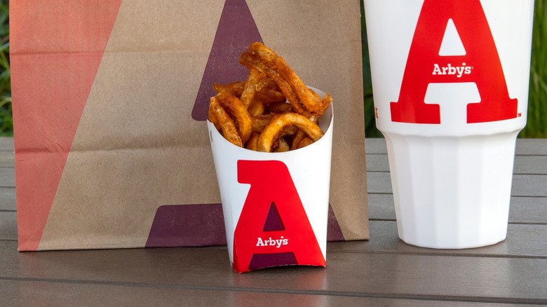 Container of Arby's curly fries