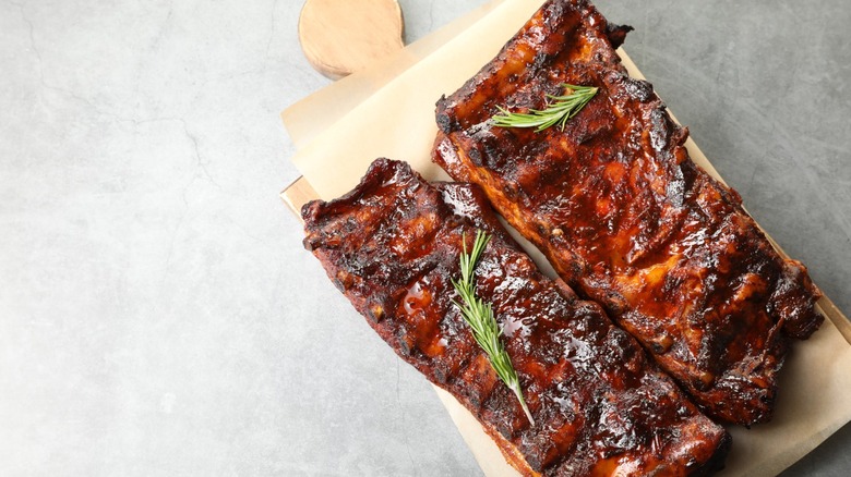 Spare ribs on a wooden board.
