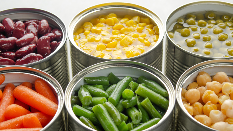 Opened cans of vegetables
