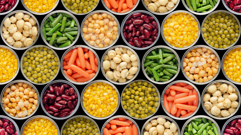 Many canned foods opened to show what's inside