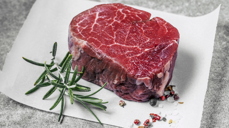 displayed raw filet mignon