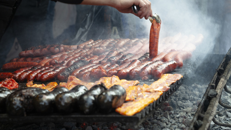 Hot dogs cooked over charcoal