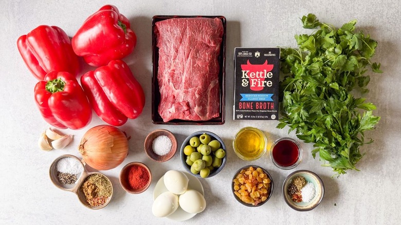 Argentinian picadillo beef-stuffed bell peppers ingredients on countertop