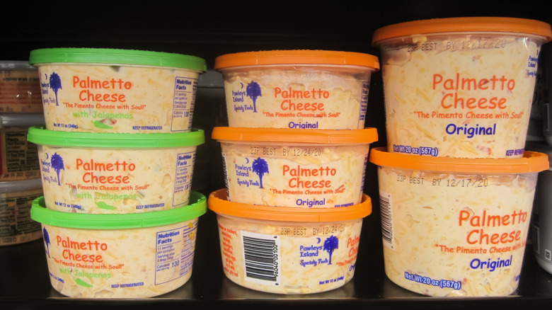 Palmetto cheese containers on grocery store shelf
