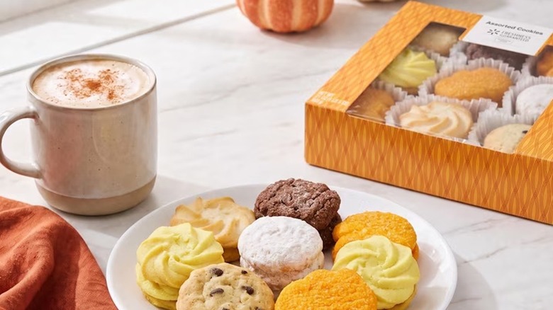 a box and plate of walmart's assorted harvest cookies