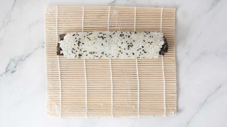Sushi roll on bamboo mat