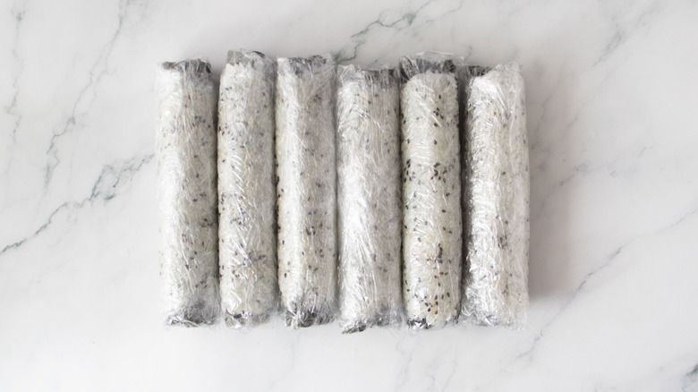Sushi rolls in plastic wrap