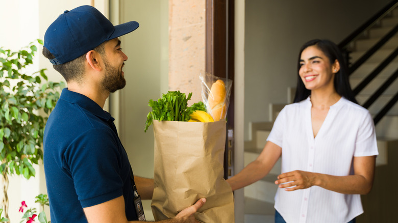 person delivering groceries