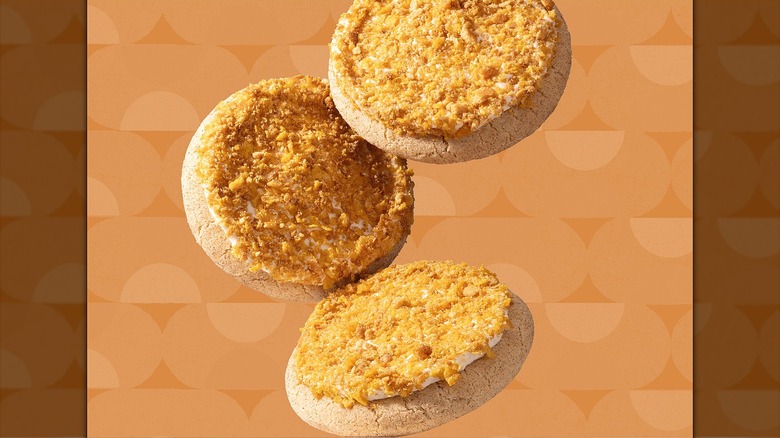 Fried ice cream cookies against orange background