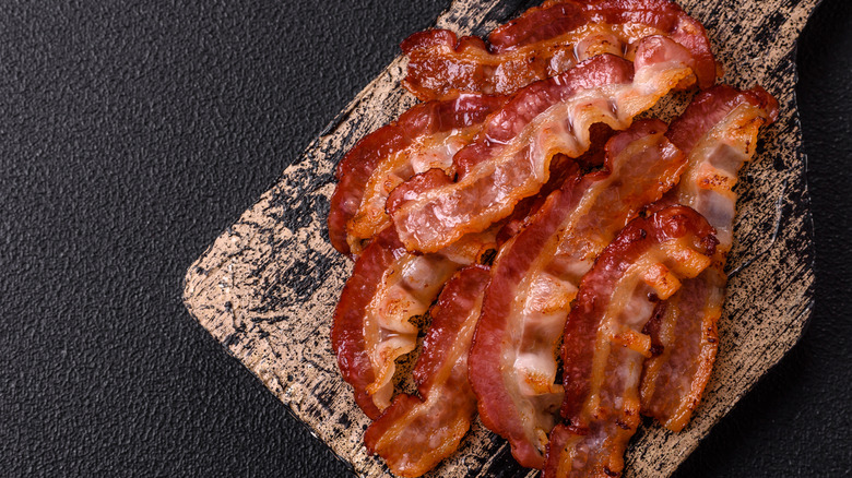 Cooked bacon on a cutting board