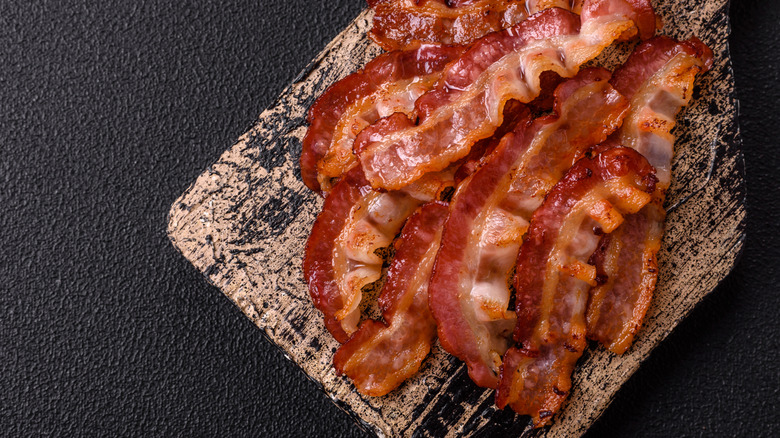 Bacon on wooden board