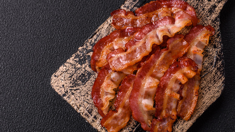 Cooked bacon on a cutting board