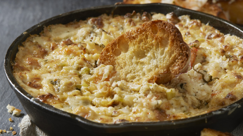 Cheesy dip with crostini