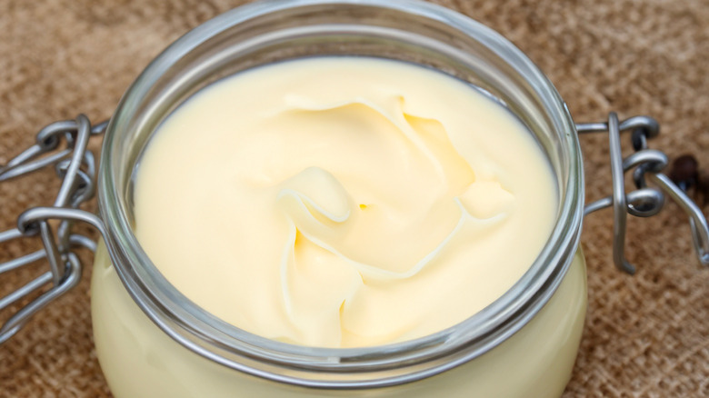 A jar of creamy beef tallow.