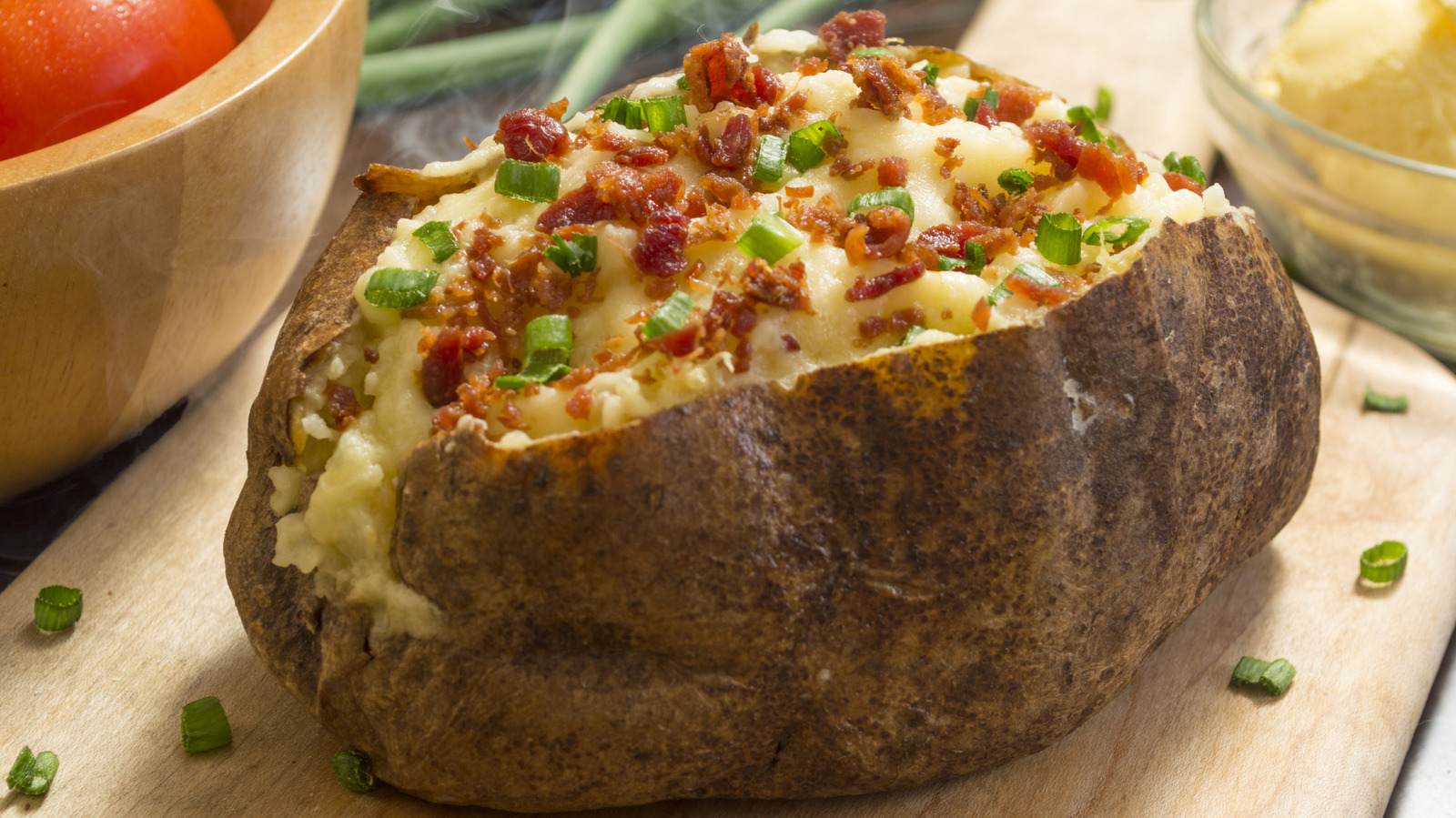The Right Way To Coat Potatoes In Butter Before Baking
