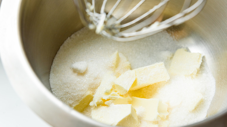 Sugar and cubed butter in a stand mixer