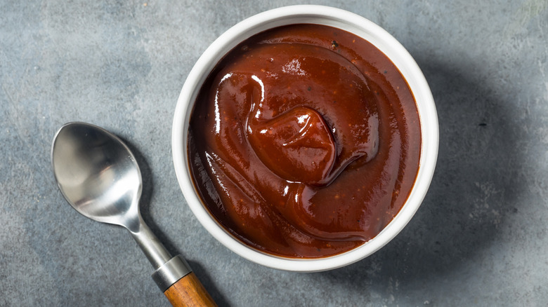 White ceramic bowl of barbecue sauce.