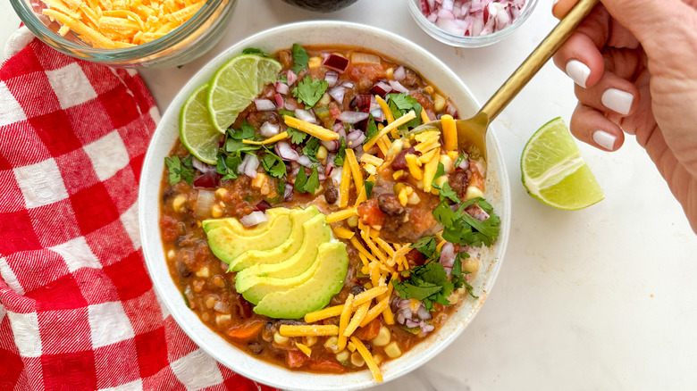 spooning out chili