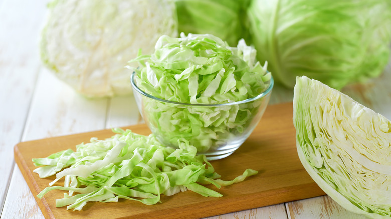 A bowl of shredded cabbage.