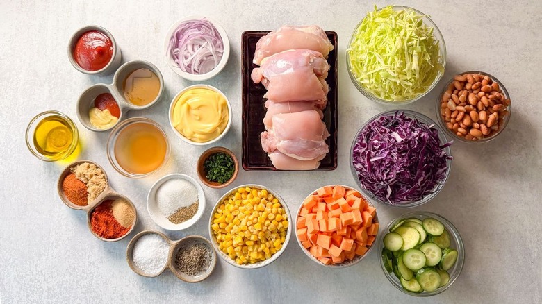 BBQ in a bowl chicken salad ingredients on countertop