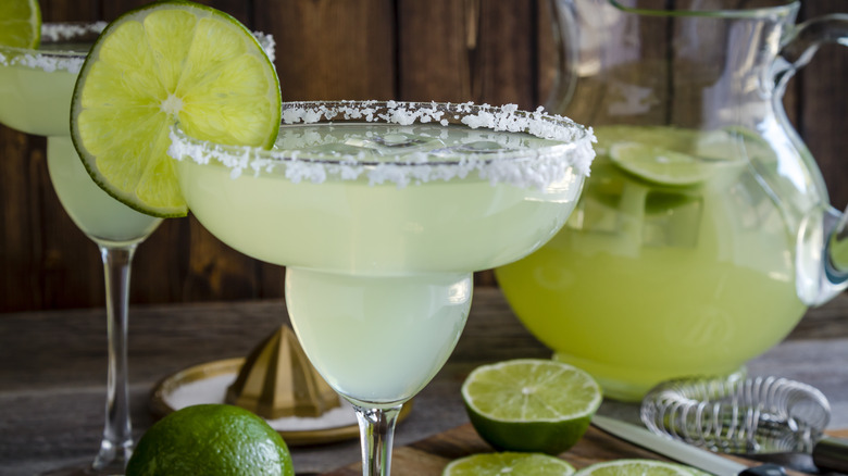 Pitcher and glass of margarita