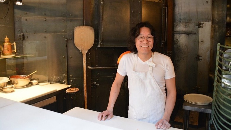 Susumu Kakinuma in front of his pizza oven at Seirinkan