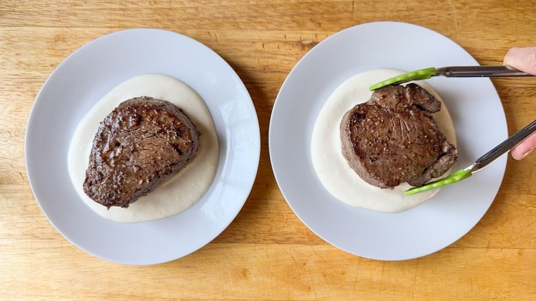 Pan-seared filet mignon on mustard cream sauce on white plates