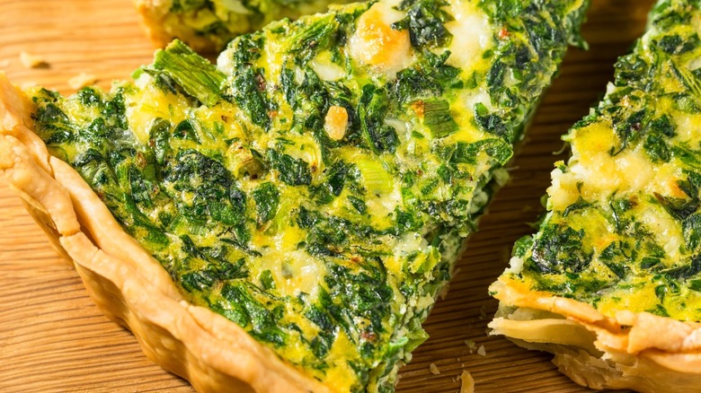 Slice of spinach and feta quiche