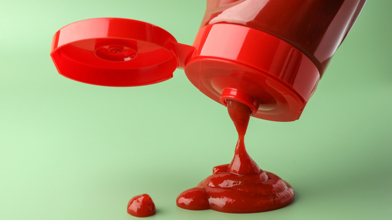 pouring ketchup from bottle