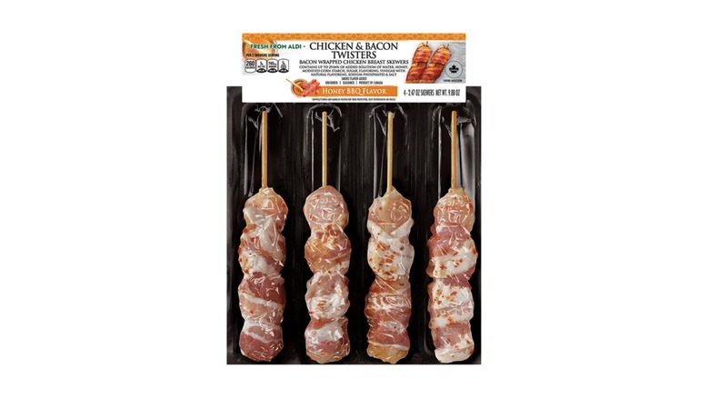 a package of Aldi's Honey BBQ Bacon-Wrapped Chicken Skewers on a white background