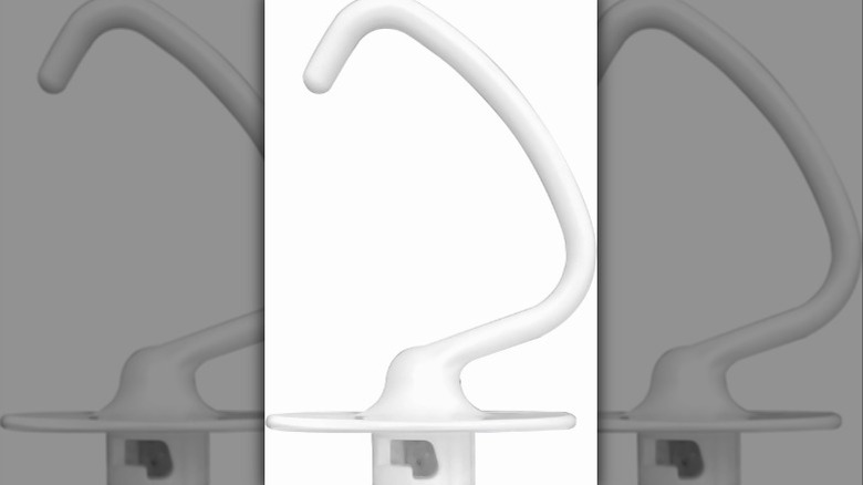 White coated dough hook on a white background