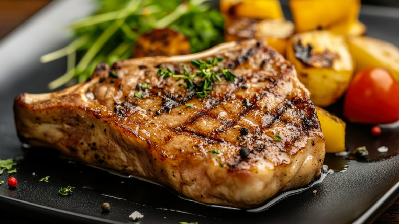 Grilled pork chops on plate