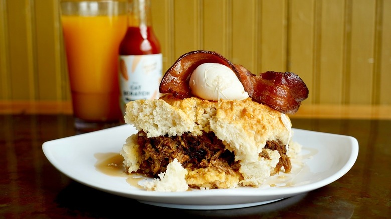 A biscuit sandwich on a plate at Biscuit Head