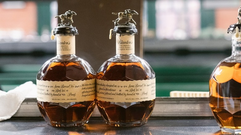 Two bottles of Blanton's Single Barrel Bourbon on a table