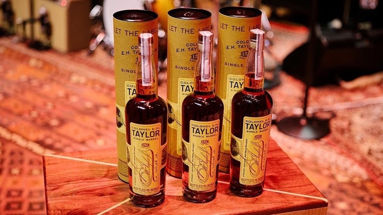 Bottles of Colonel E.H. Taylor on a wooden table