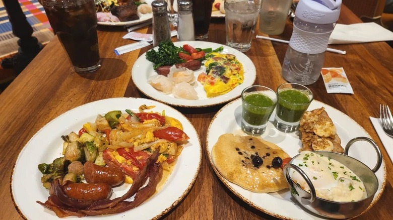 Three breakfast plates on a table at the A.Y.C.E Buffet at Palms