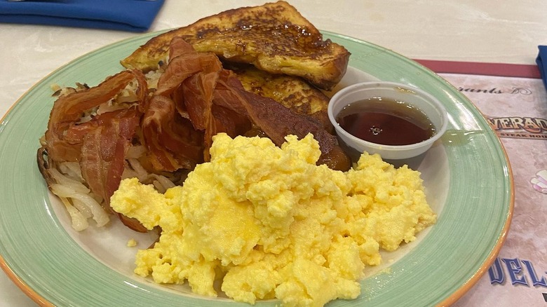 A plate of eggs, bacon, and french toast at Garden Buffet at South Point Casino