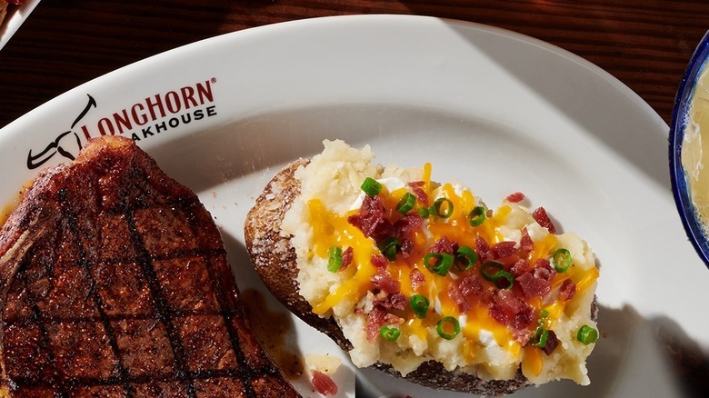 A loaded baked potato from LongHorn Steakhouse
