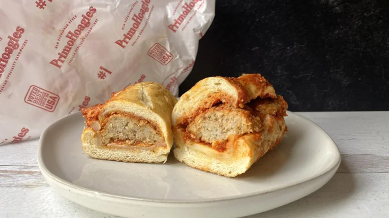 A PrimoHoagies meatball sub is on a white plate.
