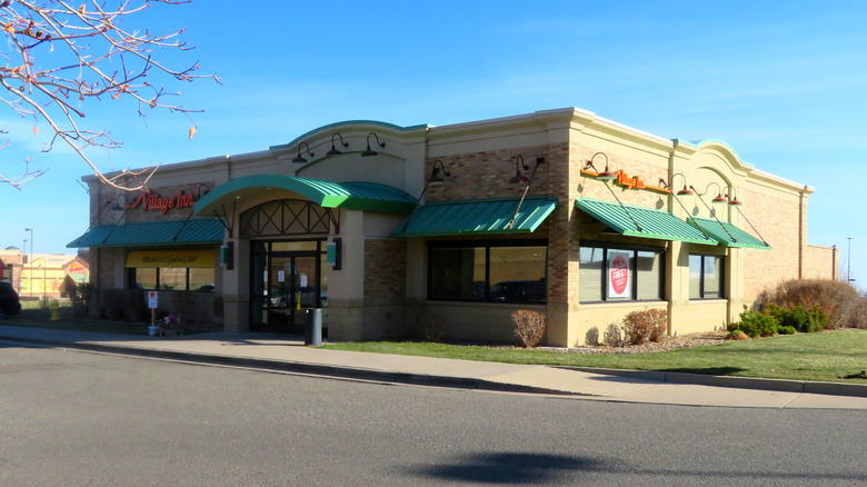 Exterior of a Village Inn location in daylight