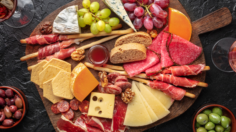 A charcuterie board  on a table at a restaurant