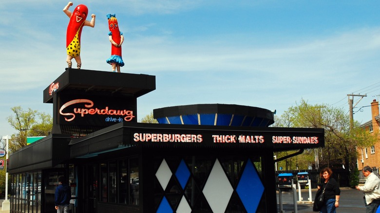 The Superdawg Drive-In restaurant on a sunny day with customers walking in