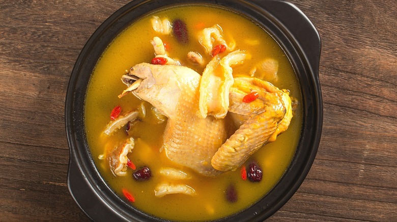 Chicken soup with whole pieces of bone-in chicken and Chinese dates