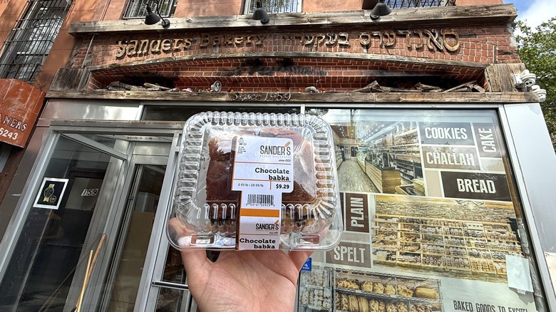 a container holding Sander's Bakery babka in front of the store