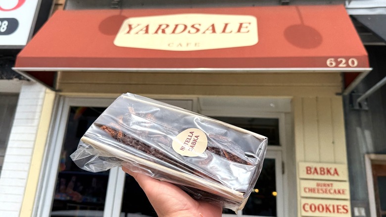 a babka in front of a bunch of Yardsale Cafe