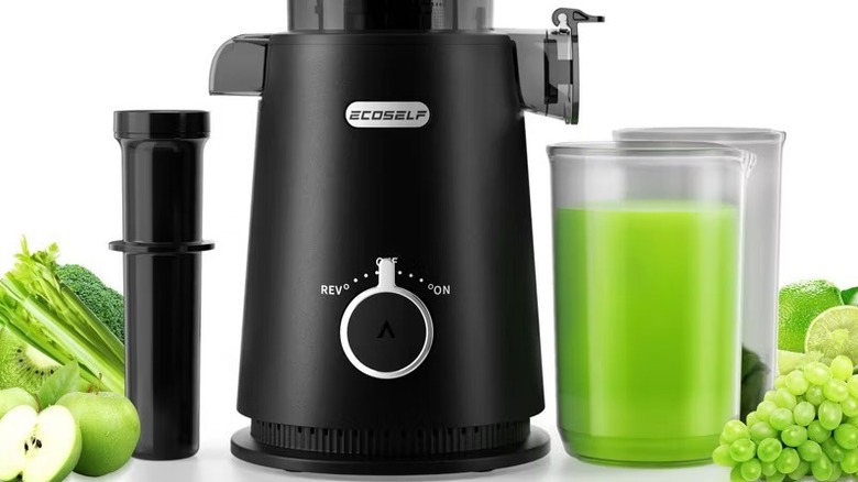Green juice and produce near an Ecoself Cold Press