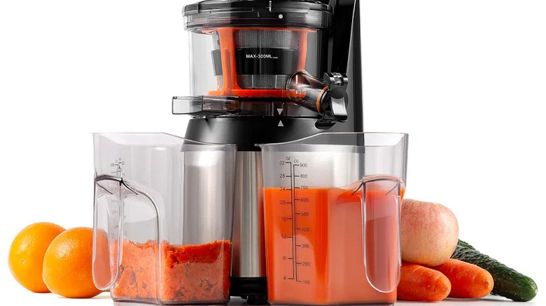 Carrot juice being made with a Ventray Juicer