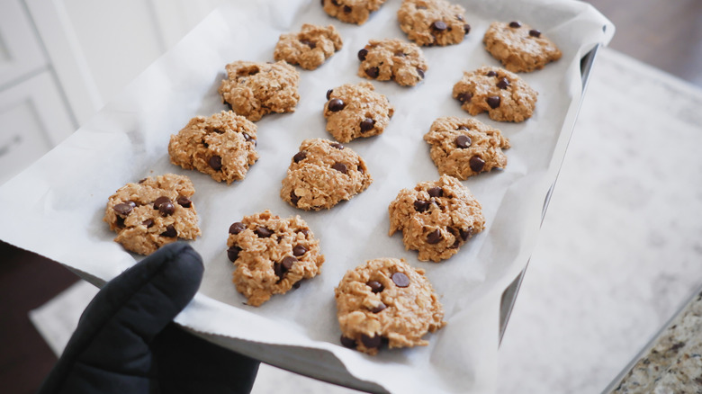 Cookies on parchment paper ready to go in the oven