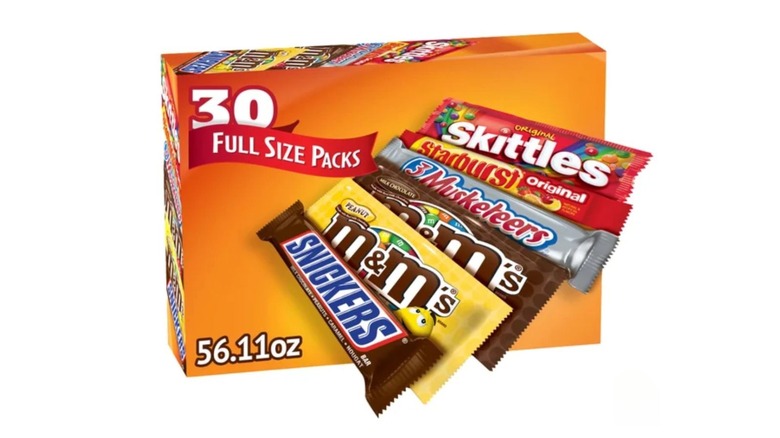 Variety pack of candy on a white background
