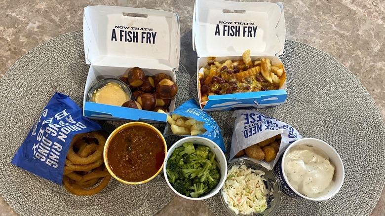 Nine Culver's side dishes arranged on a table